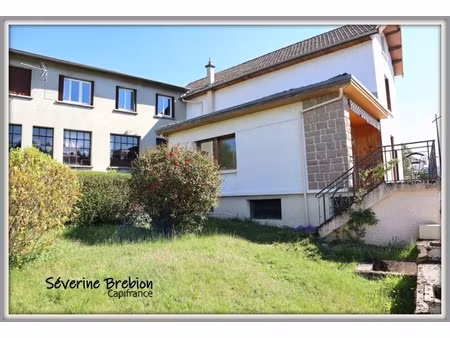 ensemble immobilier avec une maison  2 appartements loués  2 garages  3 ateliers à chabrel