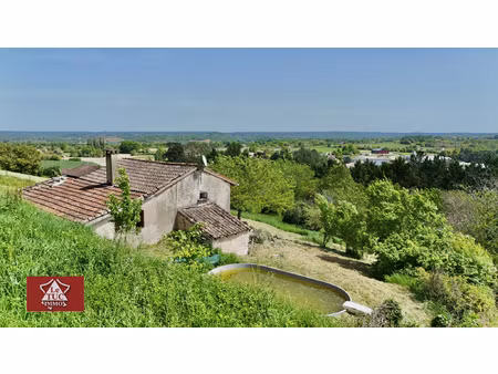 maison en pierre avec piscine et vues