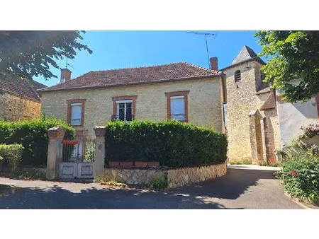 belle maison de village en pierre avec cour  garage et terrain