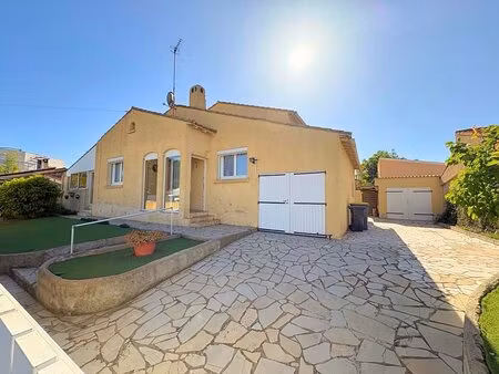 maison 4 faces sur-élevée  avec terrasse et jardin piscinable