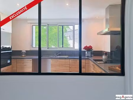 alliance parfaite entre emplacement et rénovation de qualité pour cette maison 3 chambres