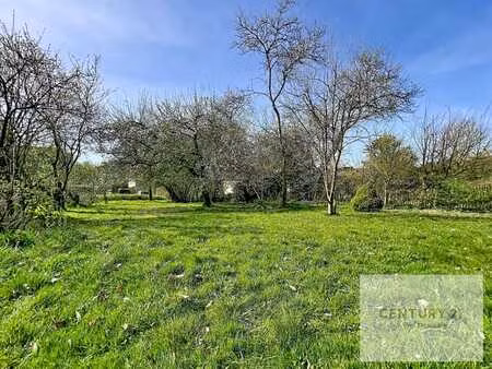 **sous option** terrain à bâtir pour construction d'une vill