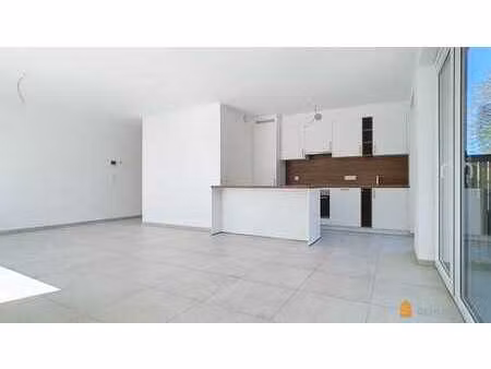 appartement 2 ch. + 2 terrasses + jardin + cave + parking