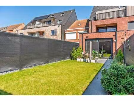 instapklaar gelijkvloers appartement met zuidtuin & garage