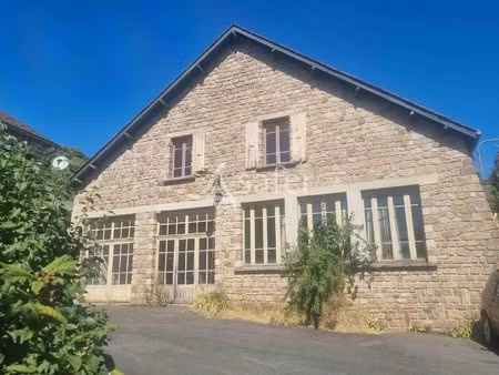 maison de village comprenant un appartement et un atelier de 100