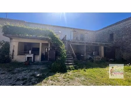 ensemble immobilier avec deux appartements  dépendances en pierre et potentiel locatif
