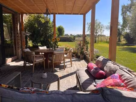 magnifique ferme carrée avec une âme  entièrement renovée