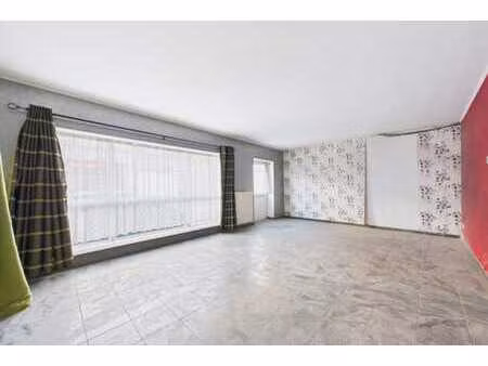 appartement 1 chambre avec parking  au centre de dottignies.
