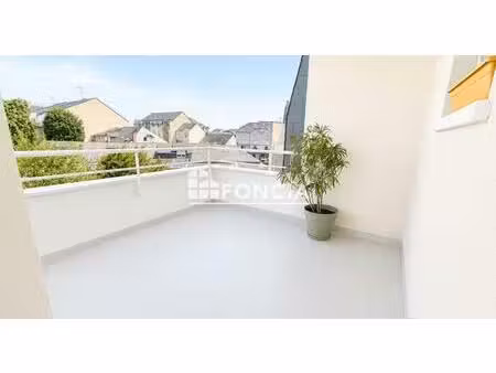 appartement récent avec terrasse – place de parking et cave