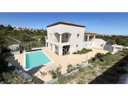 maison juvignac 8 pièce(s) avec piscine donnant sur le golf