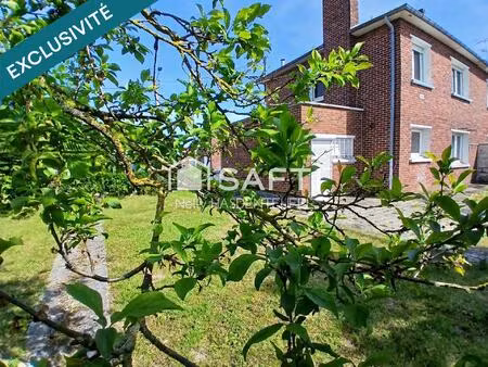 maison semi-individuelle avec garage  jardin & fort potentiel