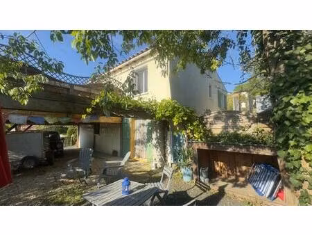 villa t4 d'environ 90m² avec garage et gite t2 en rez-de-chaussée  terrasse bois avec vue 