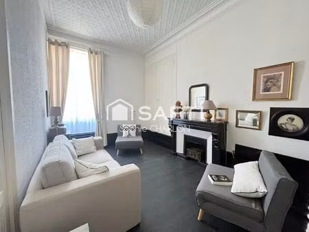appartement t2-charme haussmannien-très bon état