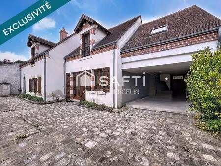 belle maison familiale en pierre de 170m² environ située en centre bourg de donnery