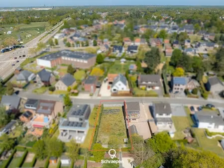 mooie bouwgrond voor halfopen bebouwing (circa 4 5 are) op top-locatie in zonhoven-centrum
