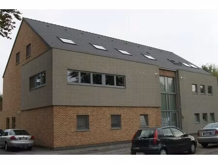gelijkvloers appartement met 2 slaapkamers + terras + tuin