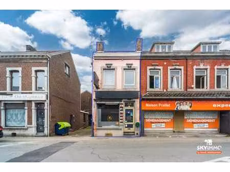 immeuble mixte -rez commercial- appartement- situé a herstal