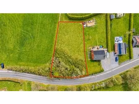 terrain à bâtir d’une superficie de 1.032 m²  entièrement pl
