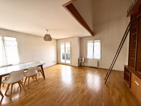 appartement duplex f5 avec balcon  cave  parking  proche tra