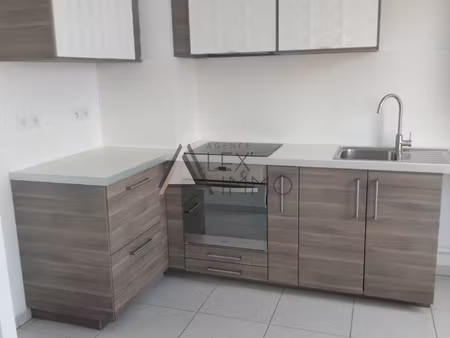 appartement 3 pieces- 56 73m2 - double parking en sous-sol -