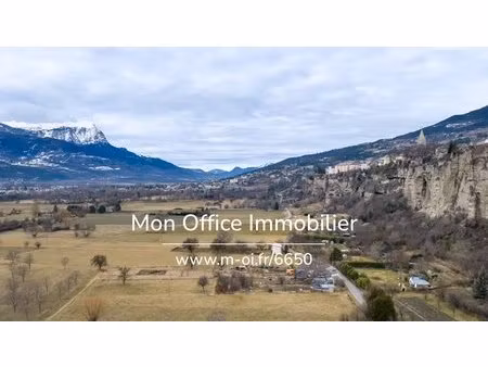 référence : 6650-clg - jardin de 1350m²  non constructible sous le roc
