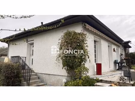 proche commerces et école