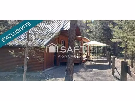 chalet de 51m² sur 2 niveaux avec garages  vide sanitaire sur 552 m² de terrain cloturé