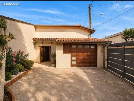 garage bati de 70m2 avec jardin de 160m2 en r+1
