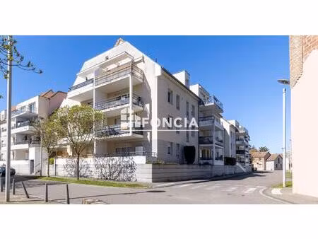 appartement 3 pièces avec balcon et deux places de parking en sous-sol