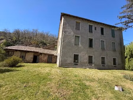 laissez-vous séduire par le charme authentique de ce moulin à rénover niché au cœur de l’a