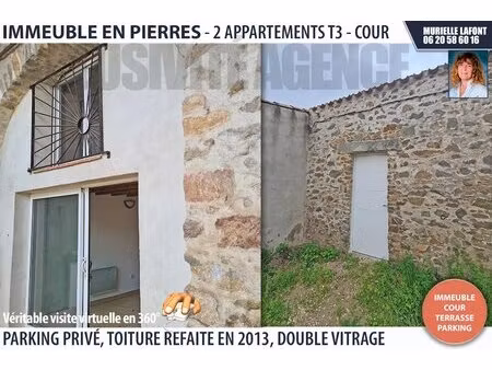 immeuble en pierres 2 appartements  grande cour  terrasse et parking