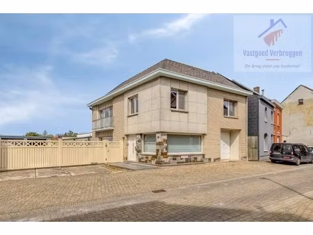 ruime woning met dubbele loods