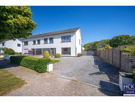 kruishoutem - ruime halfopen woning op 674 m² met 4 slpk.  aan het lozerbos!