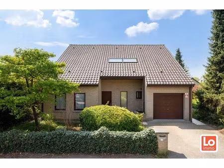 degelijke open (kangoeroe)woning met inpandige garage en gezellige zuidwest georiënteerde 