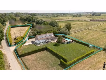 authentieke en luxueus gerenoveerde langgevelhoeve op een domein van 6.920 m².