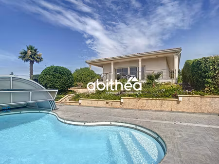 villa 4 faces - plain pied - grand terrain paysagé - piscine