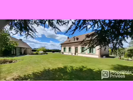 propriété avec deux maisons