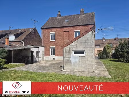 maison de 165 m2 cinq chambres et deux salle de bains avec garage et jardin.