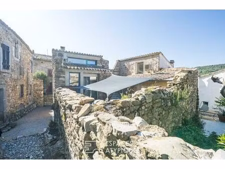 la maison qui habite le rocher