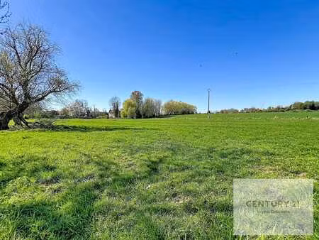 terrain agricole de 80a29ca occupé par un bail à ferme