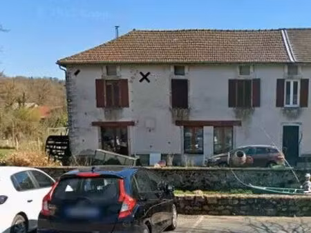 maison avec moulin