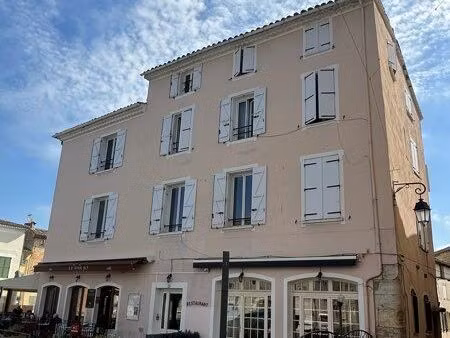 immeuble 11lots (9 appartements + 2 commerces) 500m2