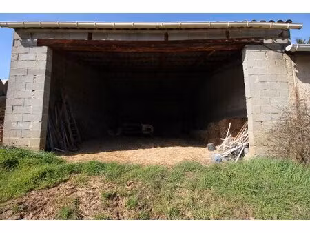a vendre deux hangars sur une parcelle de 2915m²