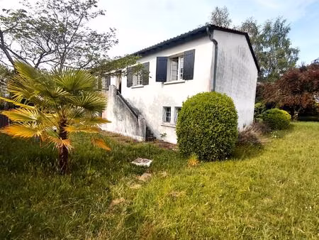 maison d'environ 90 m2 sur sous-sol
