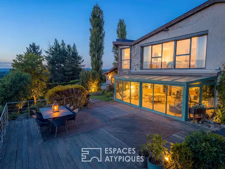 villa d'architecte avec vue panoramique sur la saône  le beaujolais et les monts du lyonna