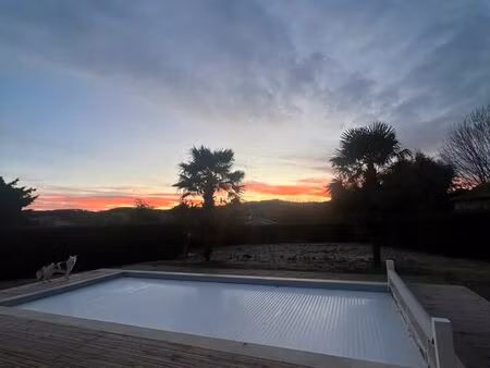 maison plain pied avec garage et piscine au sel + parcelle constructive