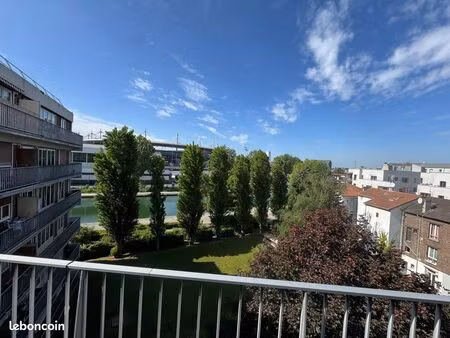 superbe 3p traversant avec balcon  vue canal & parking – 65m² – saint-denis
