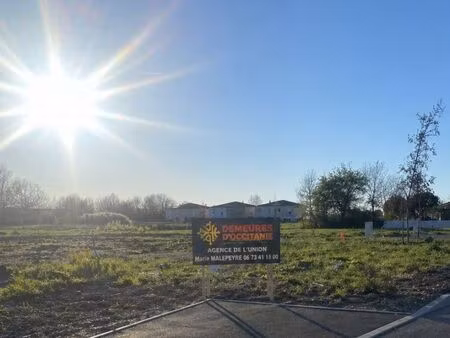 terrain 411 m² viabilisé – plein sud – prêt à bâtir à buzet sur tarn