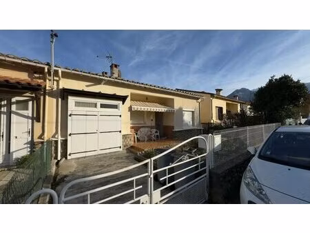 maison de plain-pied avec garage et jardin