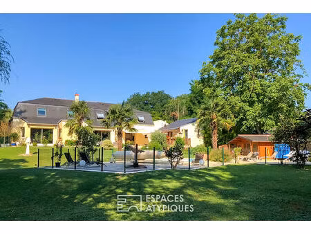 maison avec piscine dans son parc